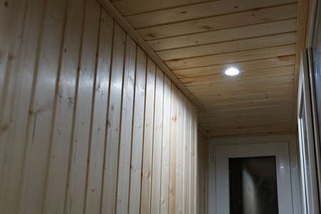 Daylight lamp built into the wooden ceiling. LED. Lightの写真素材