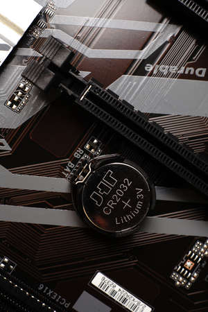 Moscow, Russia - march 3 2021: Macrophotograph of a modern branded Motherboard PC. Dimmed lightsのeditorial素材