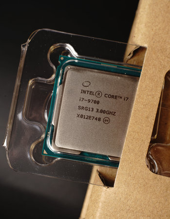 Moscow, Russia - march 3 2021: The 8-core high-performance PC processor sits in the factory box on a...