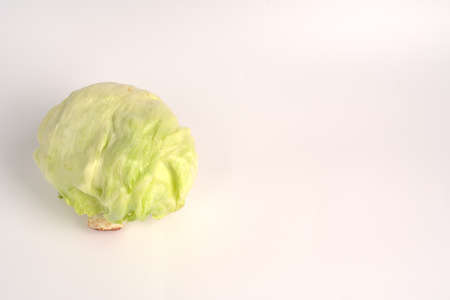 Iceberg lettuce on a white background.の写真素材