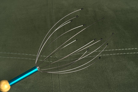 Moscow, Russia - june 8 2021: Manual massage for the head device. Allows you to relax and get rid of stress. Closeupのeditorial素材