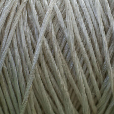 The texture of the wound strong rope passing from light to dark shade. closeup.の写真素材