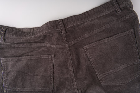 The back of dark corduroy trousers. Pockets are visible. Closeの写真素材