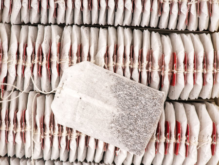 There are many tea bags in the package and one on top. Top view. Closeupの写真素材