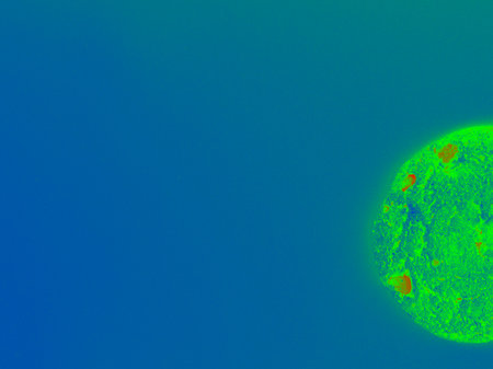A nuclear cookie on a blue background glows from radiation. Abstract painting designed to reflect on the value of life on earth and the well-being of peopleの写真素材