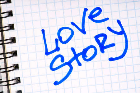 The inscription on the notebook sheet of love storyの写真素材
