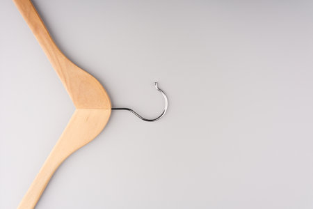 Clothes hanger on a gray background. Top viewの写真素材