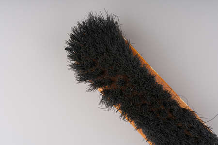 Shoe cleaning brush on a gray background. Closeupの写真素材