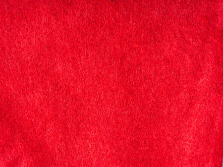 Bright red abstract fabric texture. Closeup.の写真素材
