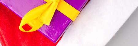 A gift box on Santa Clauss hat closeupの写真素材