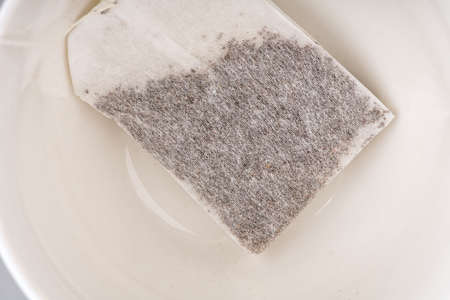 The tea bag is in the cup closeupの写真素材