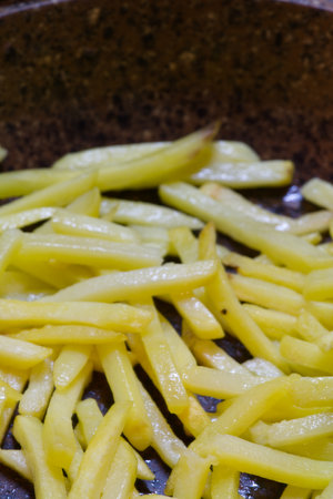 French fries at home closeup. Vertical snapshotの写真素材