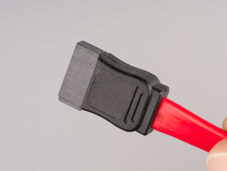 A wire connector for connecting hard drives to a computer closeupの写真素材