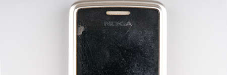 MOSCOW, RUSSIA-February 23, 2022: An old Nokia mobile phone closeup . A black and white screen is displayedのeditorial素材