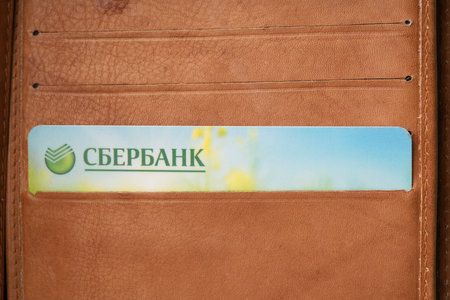 MOSCOW, RUSSIA-February 23, 2022: The credit card of the Russian bank Sberbank in the wallet....