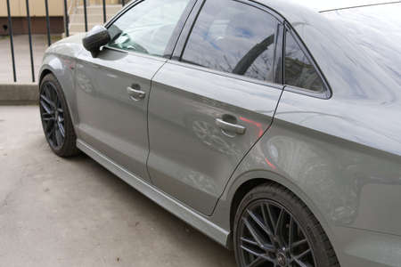 MOSCOW, RUSSIA-May 1, 2022: A modern gray Audi car on the street of a European city. Rear view. The whole car is longのeditorial素材