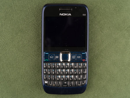 Moscow, Russia-September 16, 2022: Moscow, Russia-September 16, 2022: An old Nokia E63 push-button phone with a qwerty keyboard closeupのeditorial素材