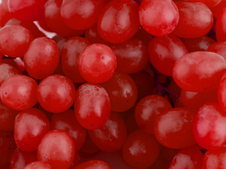 Voluminous texture of grapes in redの写真素材