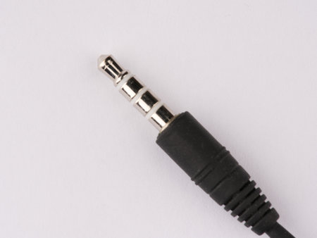 Audio wire with 3.5 jack on a white background. Closeupの写真素材