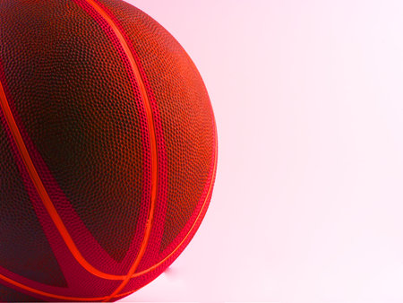 A red basketball with bright colors on a white background. Space for text.の写真素材