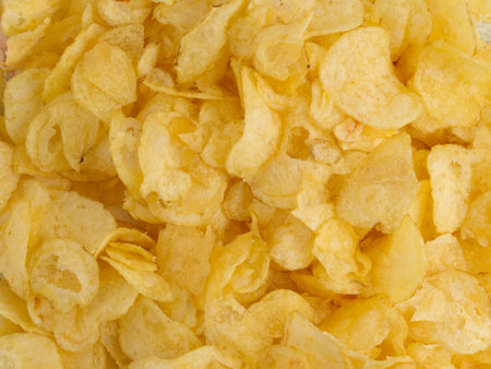 Texture of golden chips. view from above.の写真素材