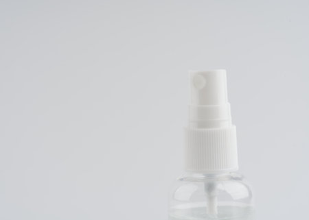 A bottle for hand disinfection on a white background. Space for textの写真素材