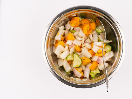 Vegetable salad in a metal bowl. view from above. Space for text.の写真素材