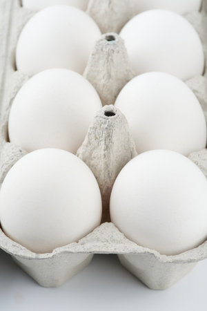 Chicken eggs in a package. vertical snapshot.の写真素材