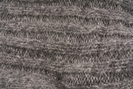 The texture of the wool closeup. Dark gray color.の写真素材
