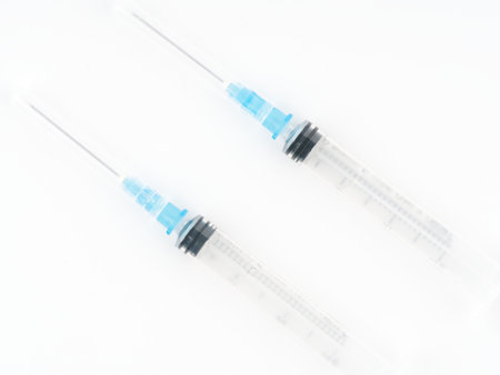 Syringes on a white background. closeup. view from above.の写真素材