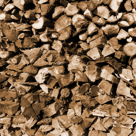 The texture of firewood laid side by side prepared for the ovenの写真素材
