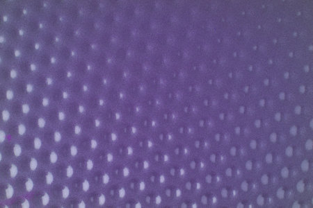 The texture is made of purple metal with many indentations. Closeupの写真素材