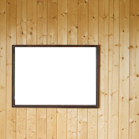 Mockup. A picture on the wall of wooden boards inside the houseの写真素材