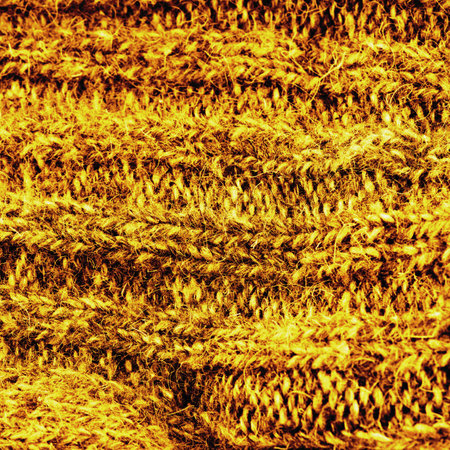 The texture of the in yellow and black color of the fabric. Closeupの写真素材