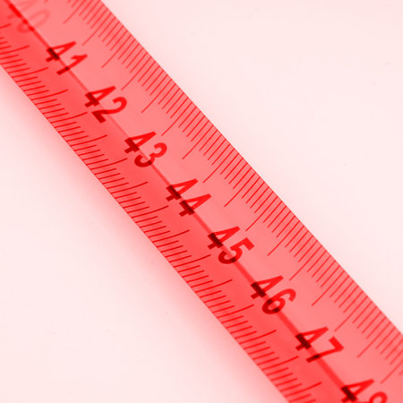 The generation of 40 year olds. Measuring ruler on a white backgroundの写真素材