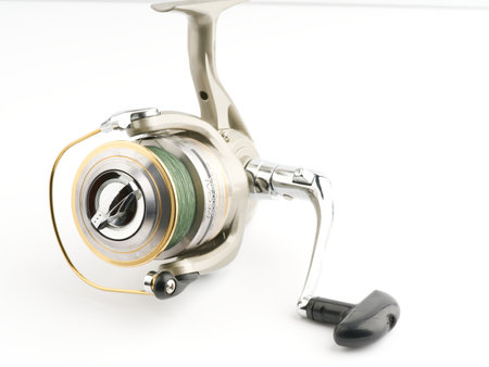 Moscow, Russia-October 16, 2022: Branded fishing reel on a white backgroundのeditorial素材
