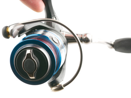 Moscow, Russia-October 16, 2022: Branded fishing reel designed for sports on a white backgroundのeditorial素材