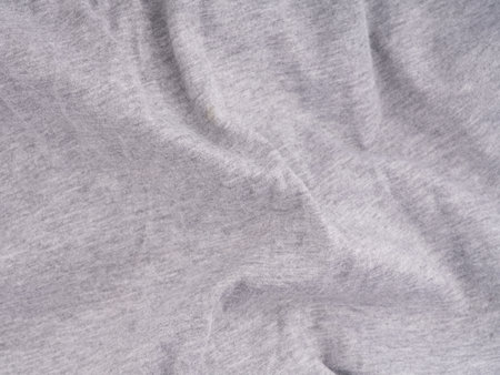 The texture of the fabric is light gray. Place for textの写真素材