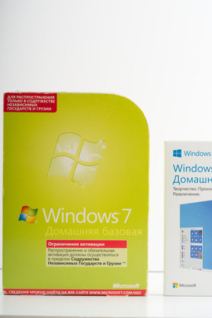 Moscow, Russia-October 16, 2022: Box with operating systems for Windows 10 and Windows 7 computer. On a white background. Vertical shotのeditorial素材