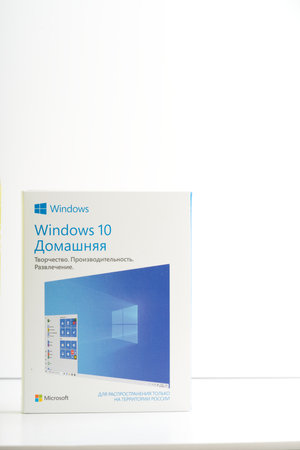 Moscow, Russia-October 16, 2022: A box with an operating system for a Windows 10 computer. On a white background. Space for textのeditorial素材