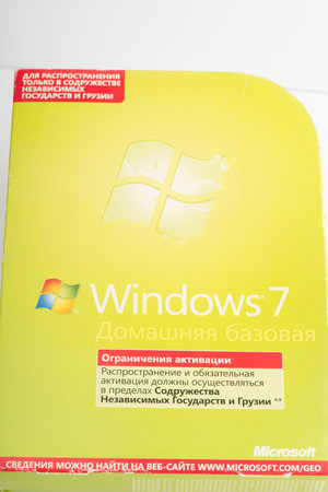 Moscow, Russia-October 16, 2022: A box with an operating system for a Windows 7 computer. Vertical shot. Closeupのeditorial素材