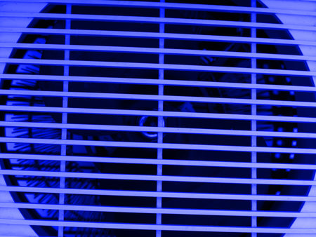 The concept of cold weather. A blue fan closeupの写真素材