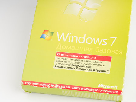 Moscow, Russia-October 16, 2022: A part of box with an operating system for a Windows 7 computer. Vertical shot. Closeupのeditorial素材
