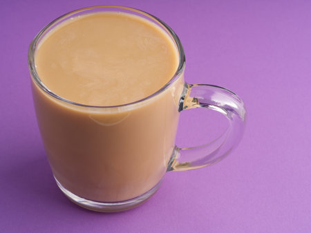 Coffee with milk in a transparent large glass. Closeupの写真素材