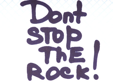 The concept of rock music. The inscription on a piece of paper dont stop the rockの写真素材