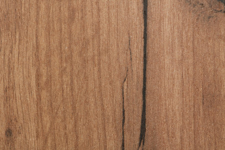 The wood texture of the cabinet lining is pale in color. With patterns. Closeupの写真素材