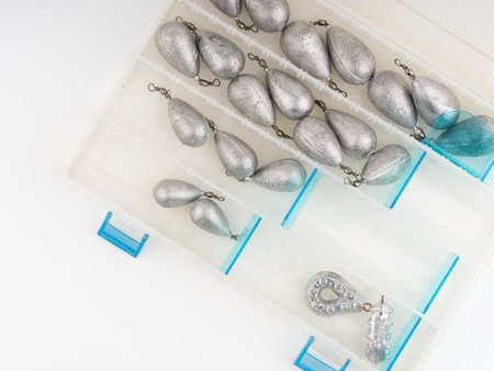 Weights for fishing rods in a box. Flatlayの写真素材