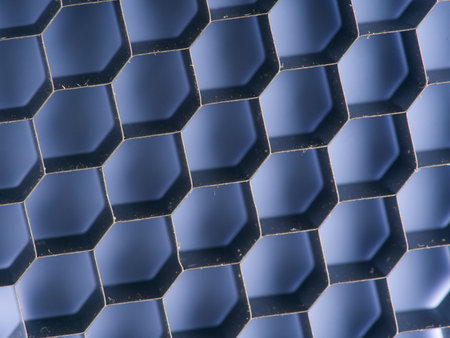 A metal cell in the form of a honeycomb. The shape is rhombic. Macroの写真素材
