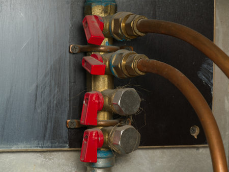 There are a lot of red switches on the water pipe. Close