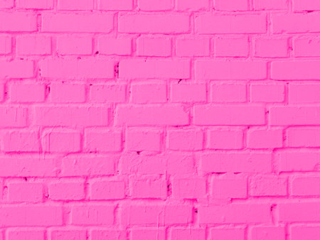 The texture of the brick wall is pink. Closeの写真素材